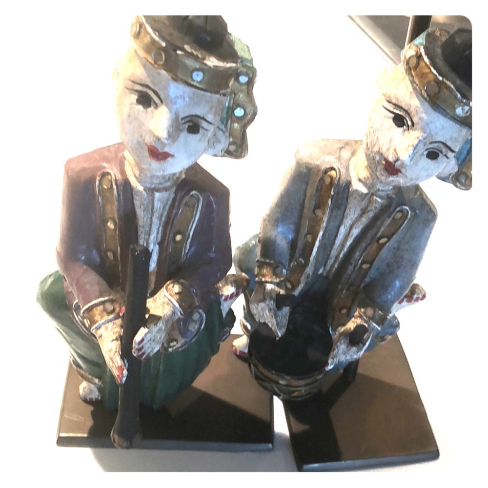Antique clowns with instruments